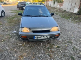 Suzuki Swift 1.3i-газова, снимка 14