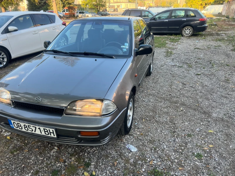 Suzuki Swift 1.3i-газова, снимка 1 - Автомобили и джипове - 47388980