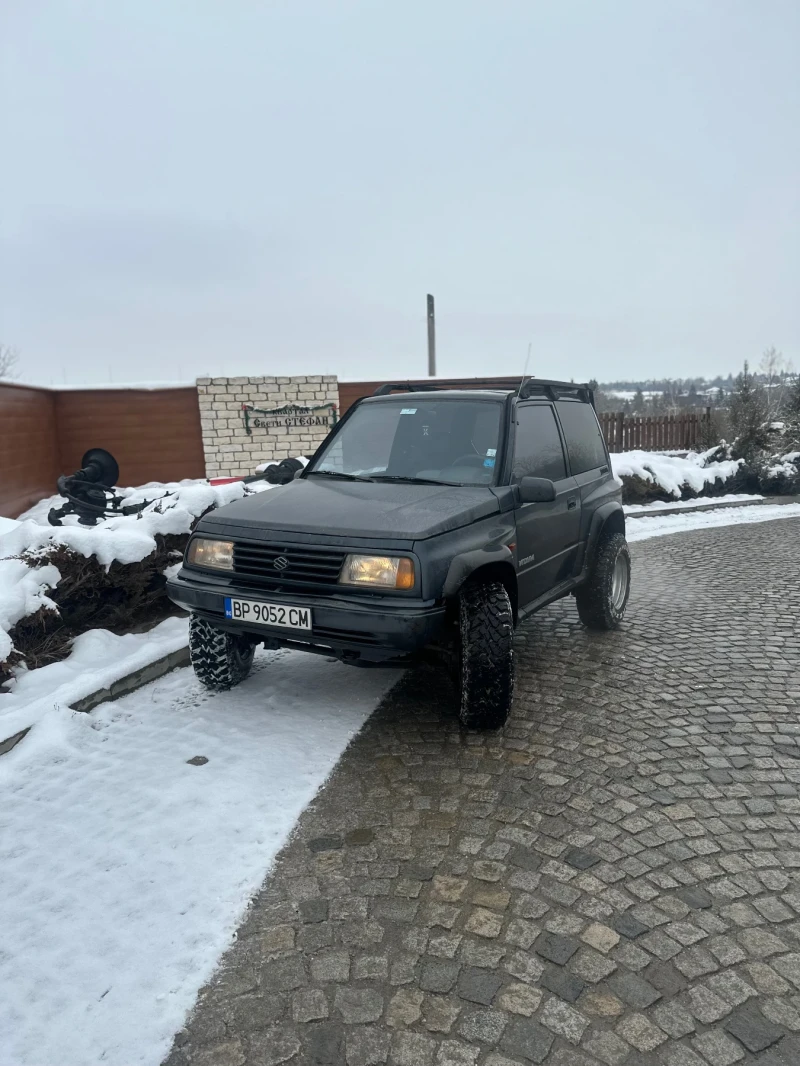 Suzuki Vitara 1.6i, снимка 11 - Автомобили и джипове - 48402773