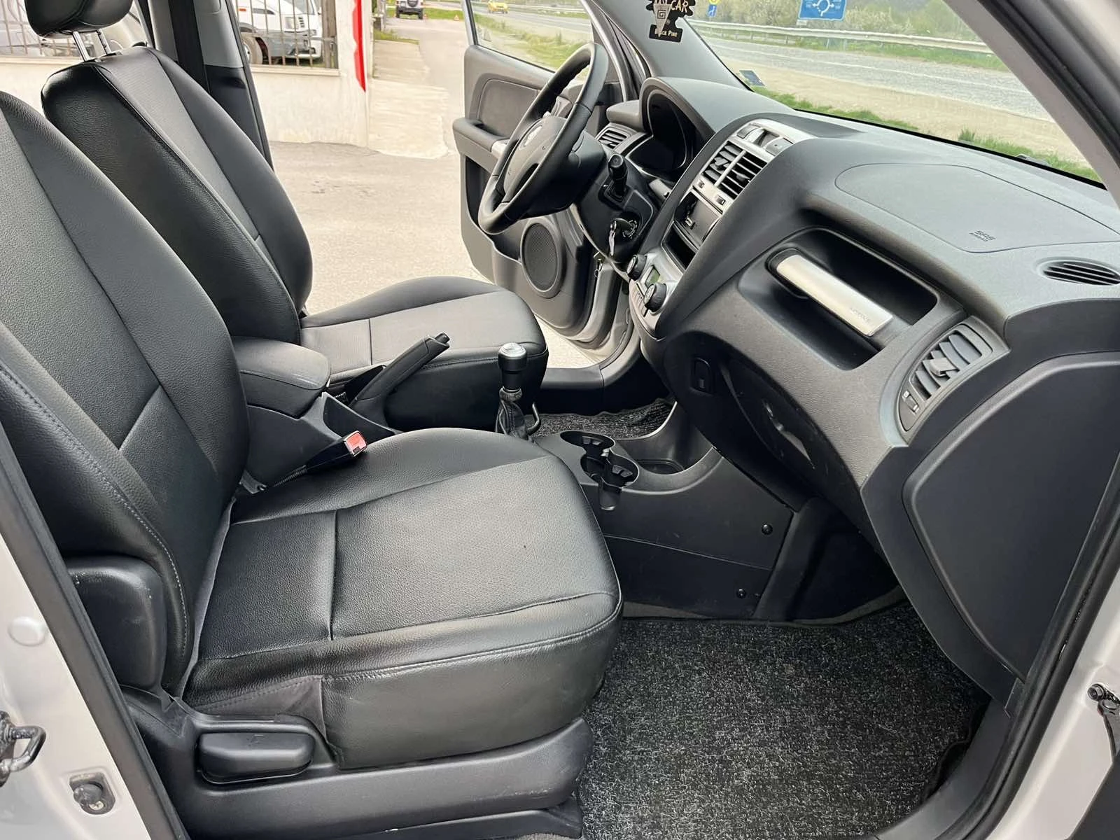 Kia Sportage 2.0I 141кс 4X4 EURO 4 КЛИМАТРОНИК ГАЗОВ ИНЖЕКЦИОН, снимка 11 - Автомобили и джипове - 54208752