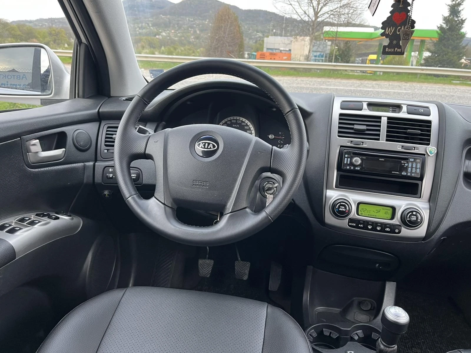 Kia Sportage 2.0I 141кс 4X4 EURO 4 КЛИМАТРОНИК ГАЗОВ ИНЖЕКЦИОН, снимка 12 - Автомобили и джипове - 54208752