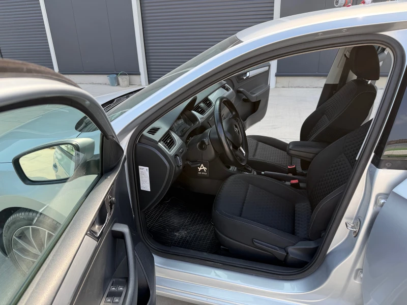 Skoda Rapid 1.4tdi, снимка 10 - Автомобили и джипове - 51710265