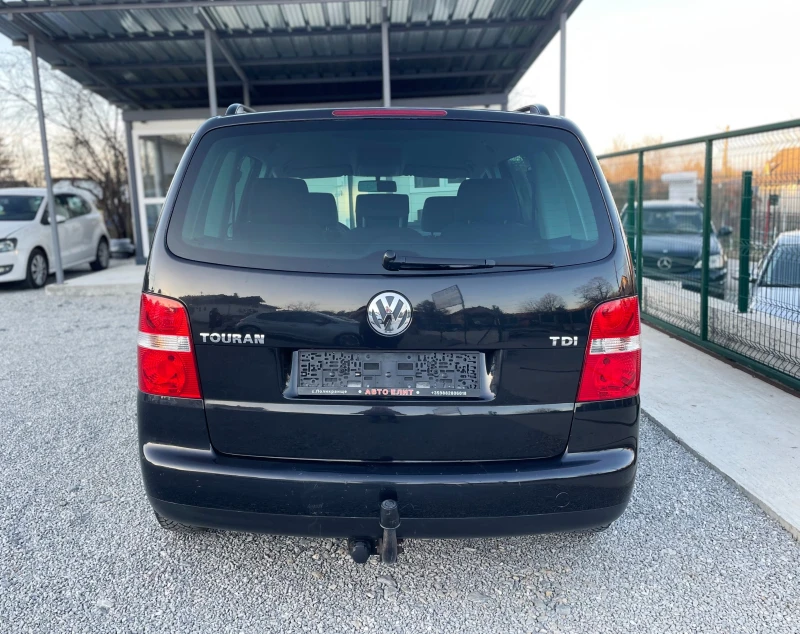 VW Touran 1.9TDI* ЕВРО 4* НАВИГАЦИЯ* НОВИ ГУМИ, снимка 5 - Автомобили и джипове - 49440104