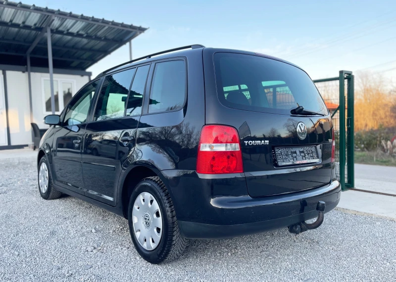 VW Touran 1.9TDI* ЕВРО 4* НАВИГАЦИЯ* НОВИ ГУМИ, снимка 4 - Автомобили и джипове - 49440104