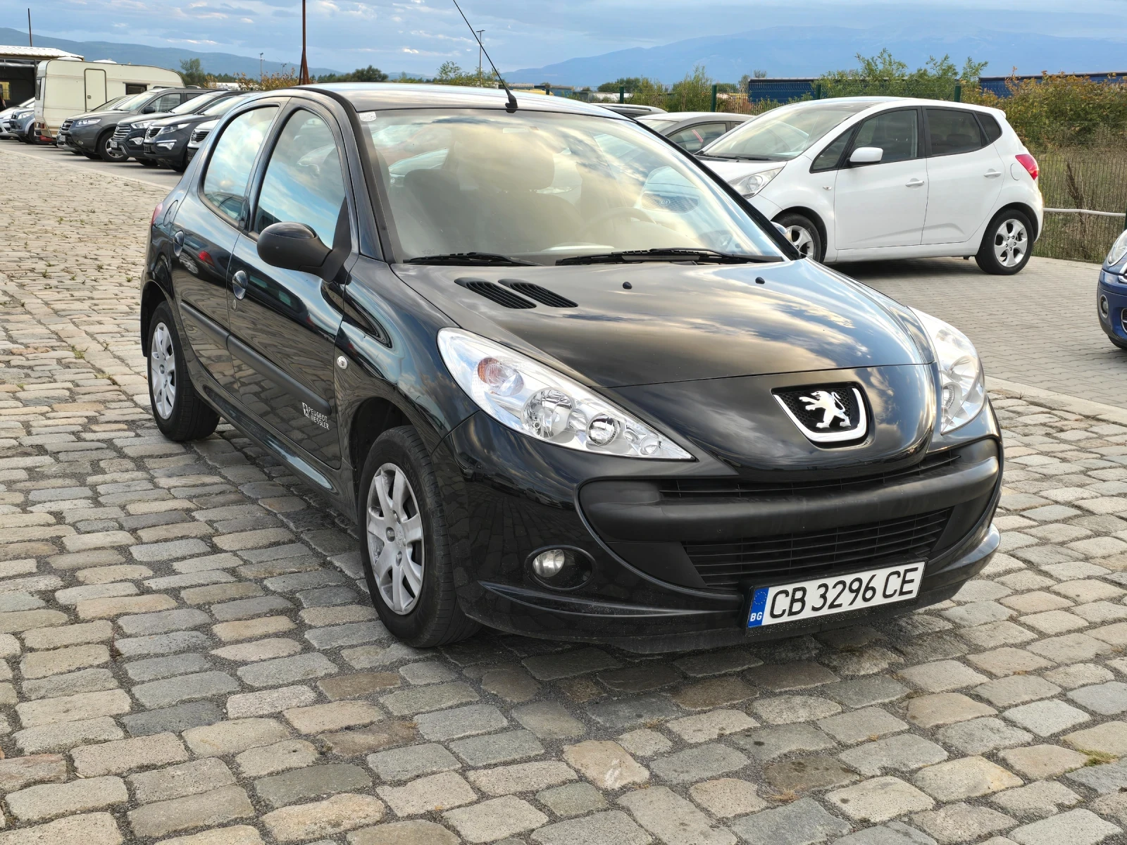 Peugeot 206 Plus 1.4i 75 кс 2011 година ЕВРО 5 ВСИЧКО ПЛАТЕНО  - изображение 3