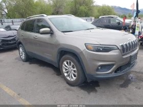 ������ Jeep Cherokee