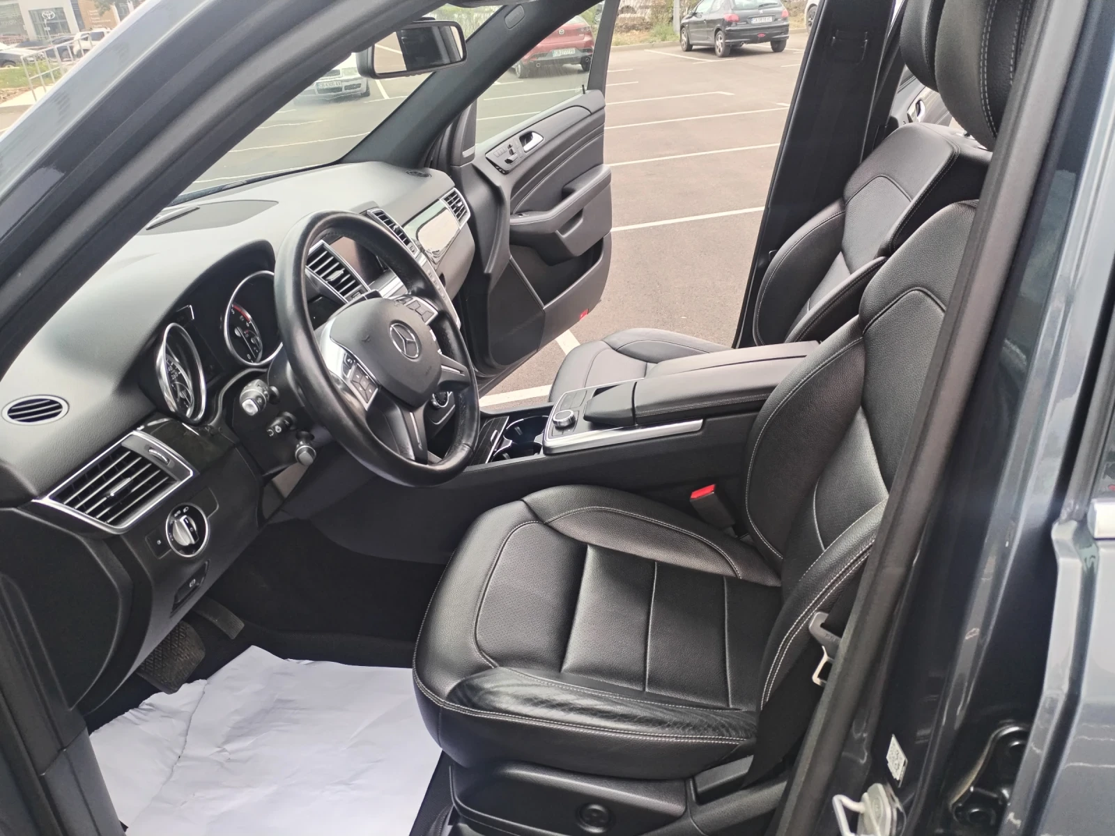 Mercedes-Benz ML 350 AMG OPTIK, HARMAN KARDON, PANORAMA, CARFAX, снимка 14 - Автомобили и джипове - 54997762