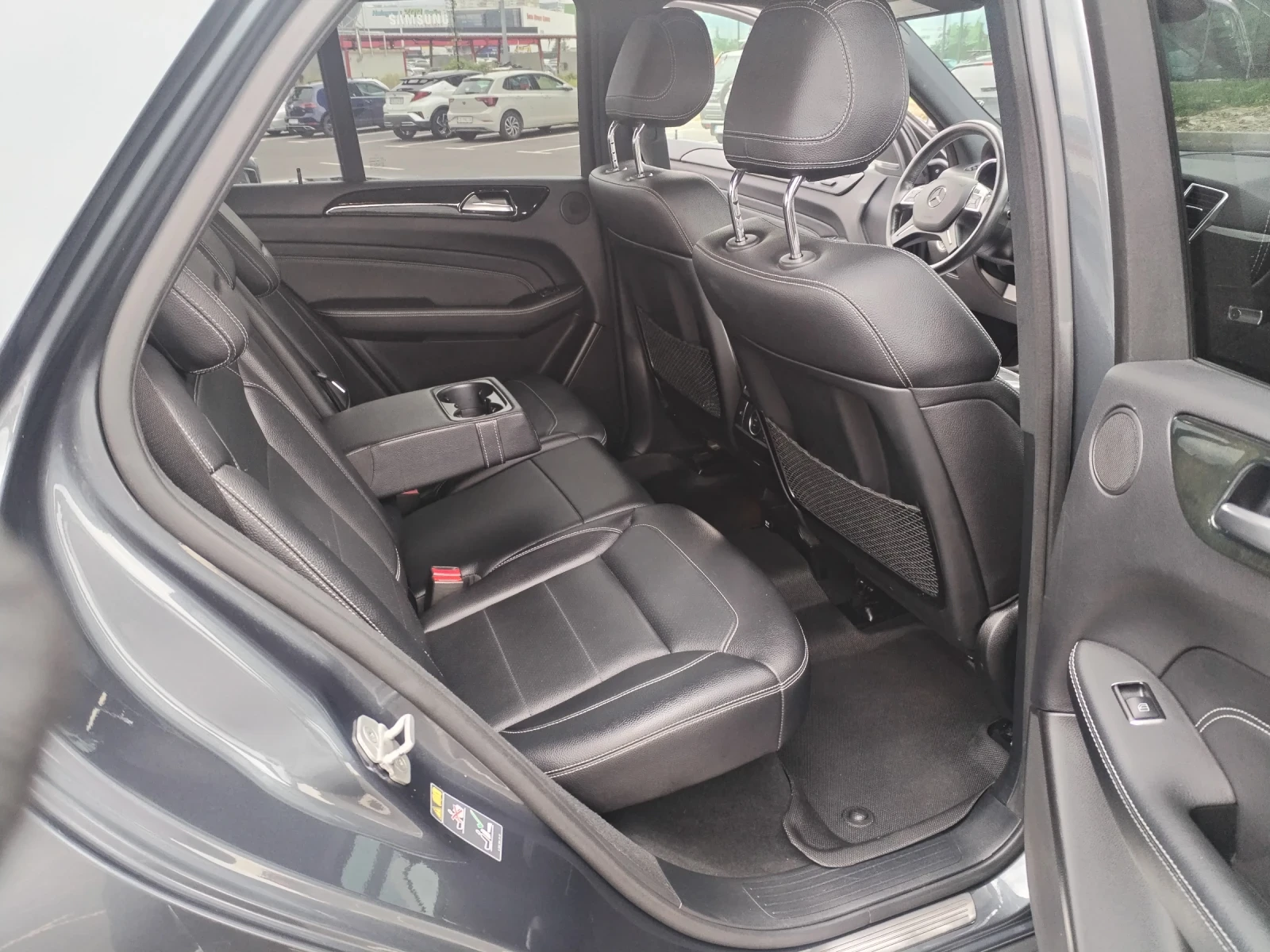 Mercedes-Benz ML 350 AMG OPTIK, HARMAN KARDON, PANORAMA, CARFAX, снимка 16 - Автомобили и джипове - 54997762