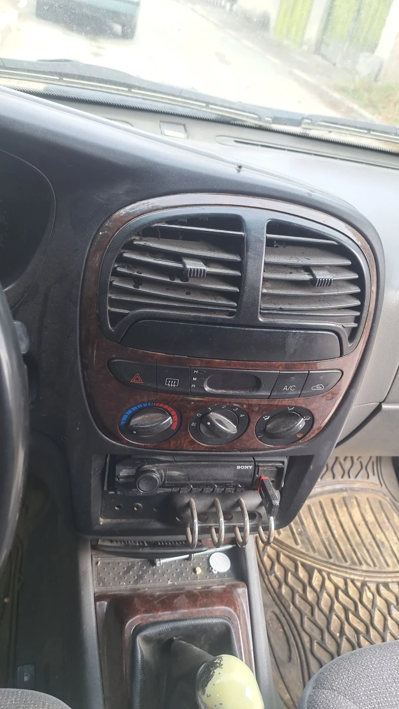 Kia Sportage, снимка 6 - Автомобили и джипове - 47623418