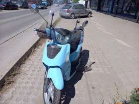     Kymco People