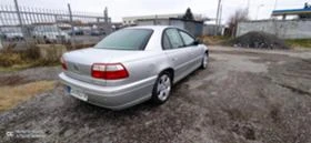     Opel Omega 2.6 v-6-180.