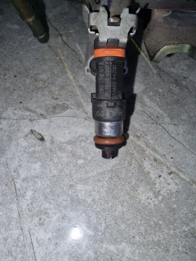 0280158013  16600AX200 инжекторна дюза BOSCH  NISSAN MICRA K12 1.2 