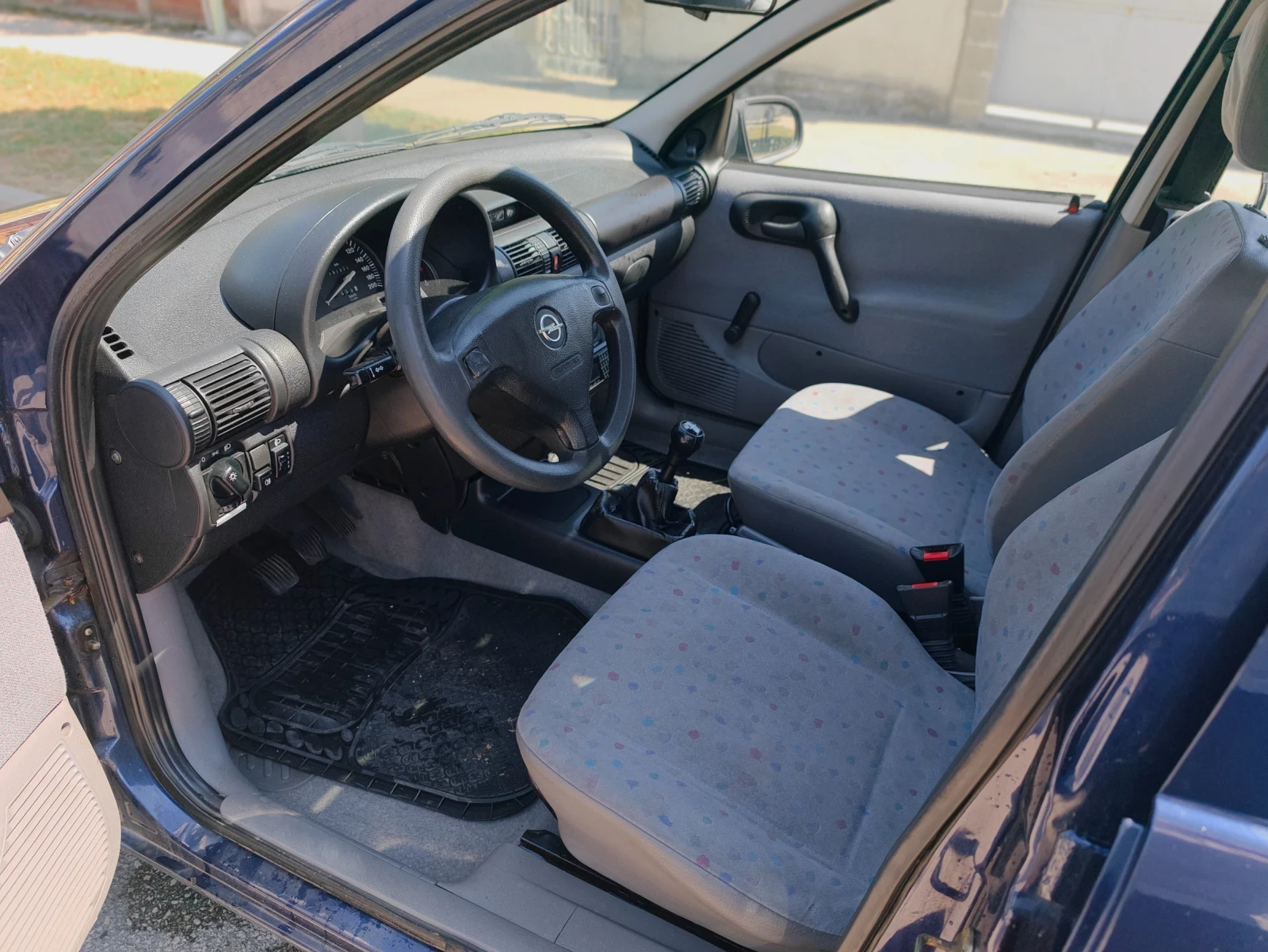 Opel Corsa 1.0i 12v, снимка 10 - Автомобили и джипове - 55536640
