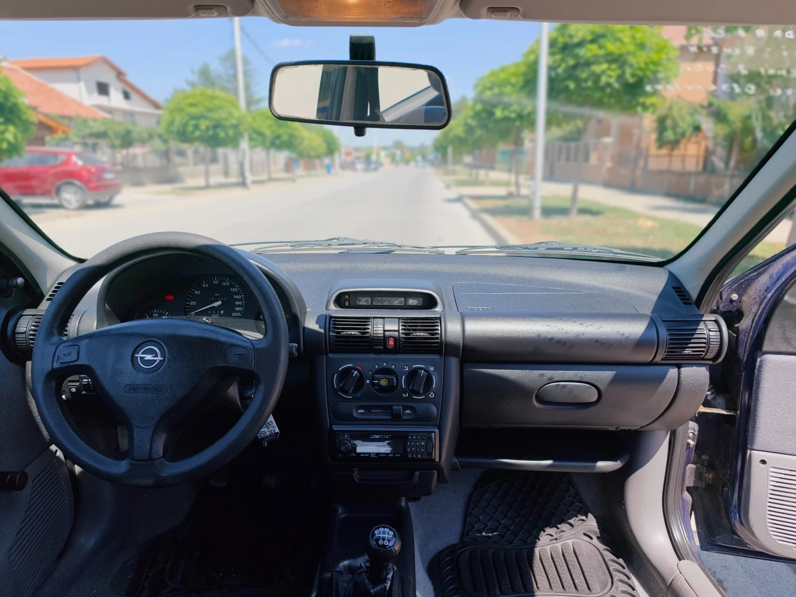 Opel Corsa 1.0i 12v, снимка 9 - Автомобили и джипове - 55536640