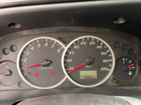 Mazda Tribute, снимка 9