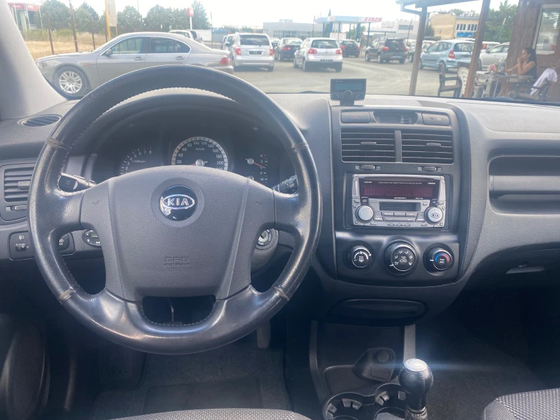 Kia Sportage 2.0i  4x4, снимка 9 - Автомобили и джипове - 46114129