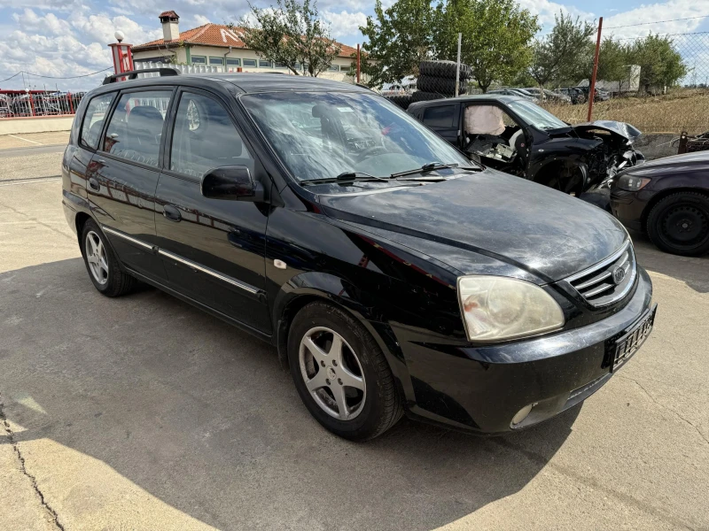 Kia Carens 2.0, снимка 4 - Автомобили и джипове - 47264991