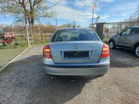 Skoda Octavia 1.9 TDI  - 6490 лв. / 3318.28 € - 65398419 6