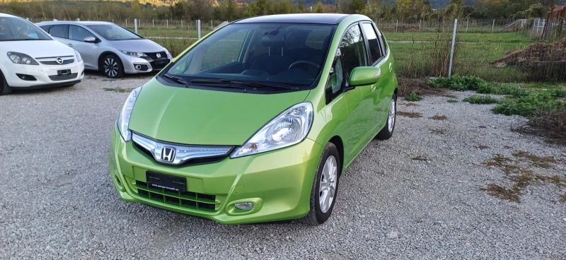 Honda Jazz 1.3HYBRIT SWISS, снимка 4 - Автомобили и джипове - 48355334