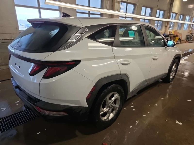 Hyundai Tucson * ESSENTIAL * CARFAX * ЦЕНА ДО БГ, снимка 4 - Автомобили и джипове - 53584124