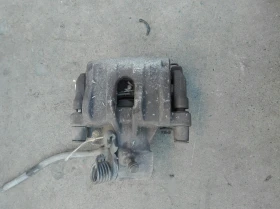 спирачен апарат заден десен Форд фокус 1.8тдци