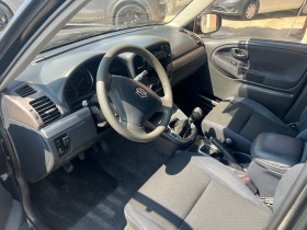 Suzuki Grand vitara 2.0i Клима , 4x4 , БЕЗ РЪЖДА, снимка 13