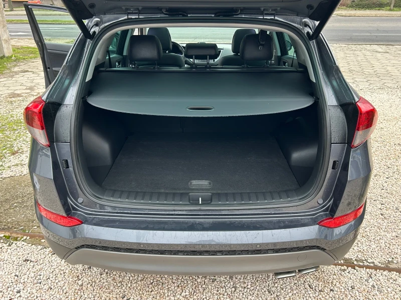 Hyundai Tucson 2.0 CRDI AUTOMAT 4X4, снимка 14 - Автомобили и джипове - 53432414