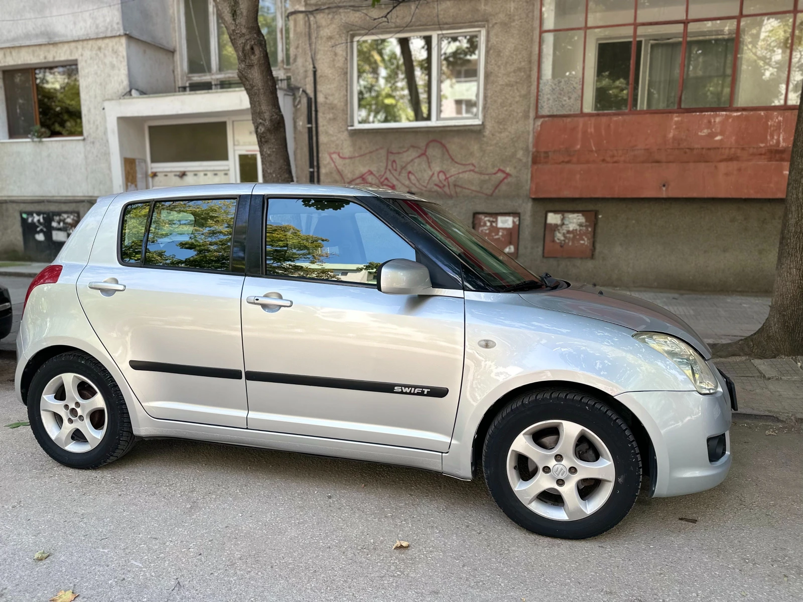 Suzuki Swift 1.3, снимка 16 - Автомобили и джипове - 56008284