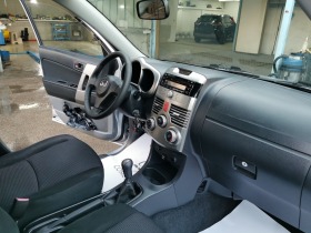 Daihatsu Terios 1.5 VVTI - 4WD, снимка 11 - Автомобили и джипове - 44372344