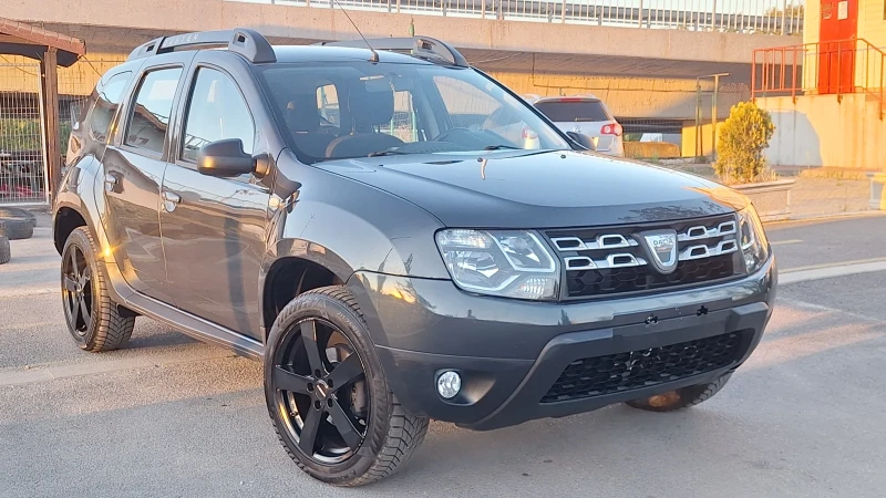 Dacia Duster 1.6 4x4 Rs Dacia black Swiss Edtion Navi Park, снимка 1 - Автомобили и джипове - 46850861