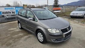     VW Touran 1.6i-Euro-4