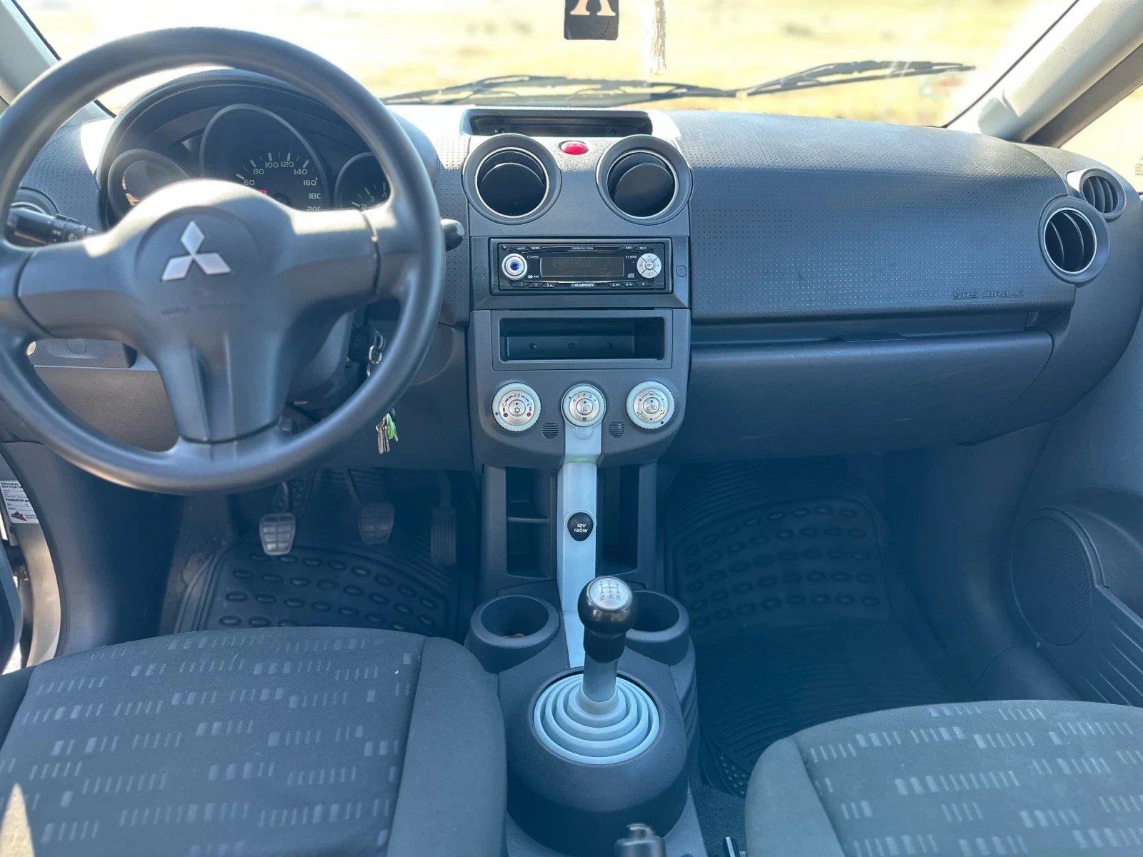 Mitsubishi Colt 1.5 - изображение 7