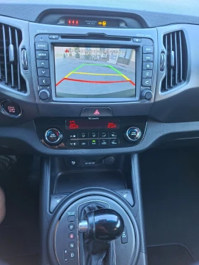 Kia Sportage 2.0CRDI 4x4 , кейлес , кожа , автомат., снимка 10