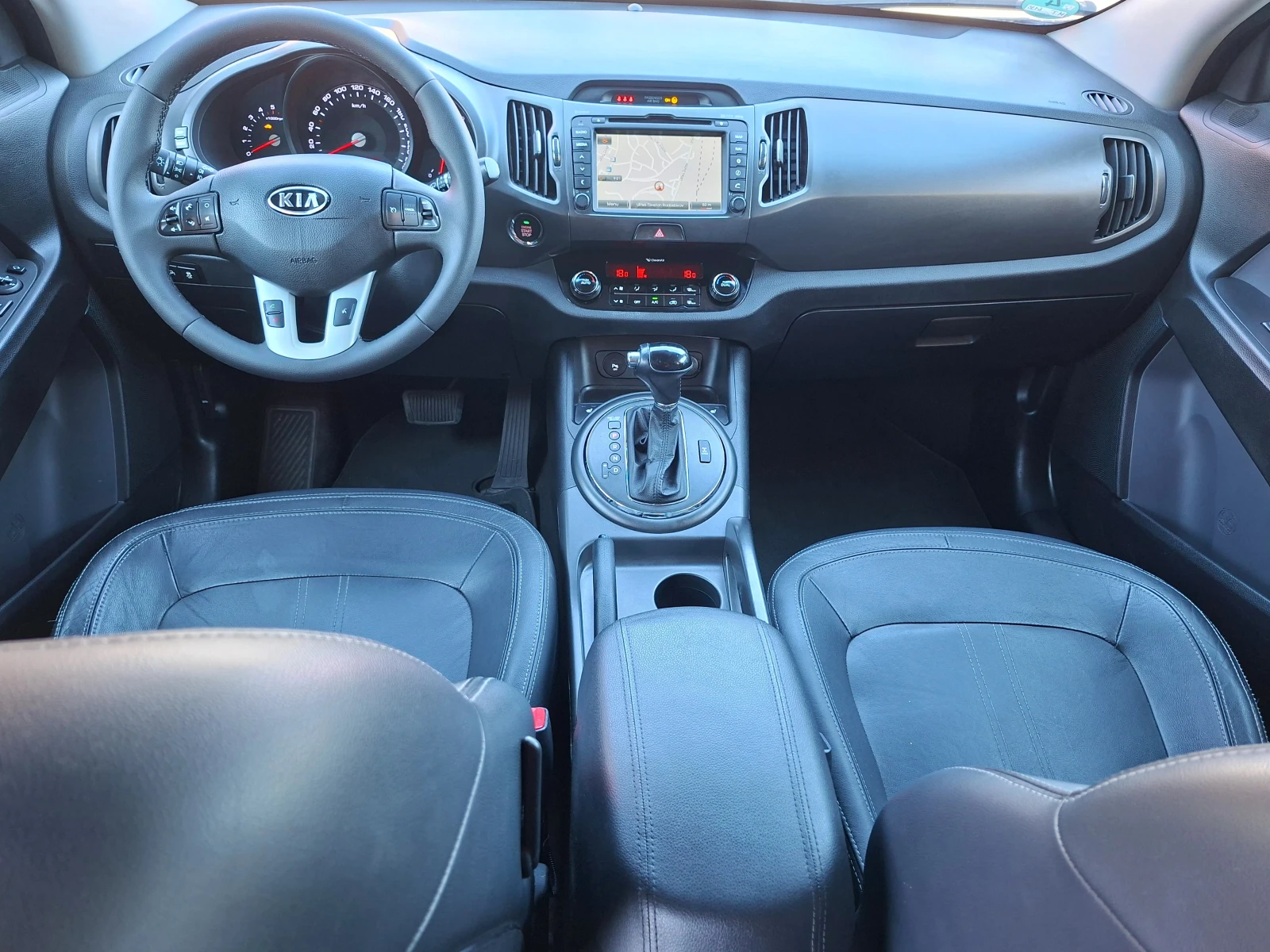 Kia Sportage 2.0CRDI 4x4 , кейлес , кожа , автомат., снимка 8 - Автомобили и джипове - 55677119