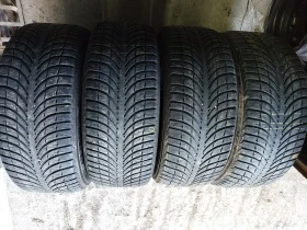 Гуми Зимни 255/55R19, снимка 1 - Гуми и джанти - 44383017