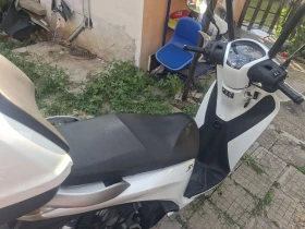 Обява за продажба на Honda Sh Уникално запазен 150i 2015г.ABS старт стоп система ~2 799 лв. - изображение 9