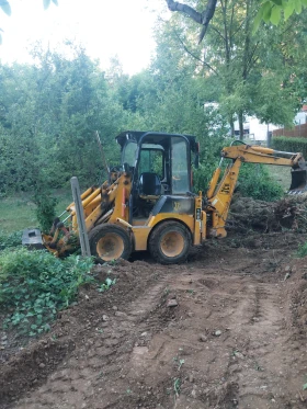      JCB 1CX