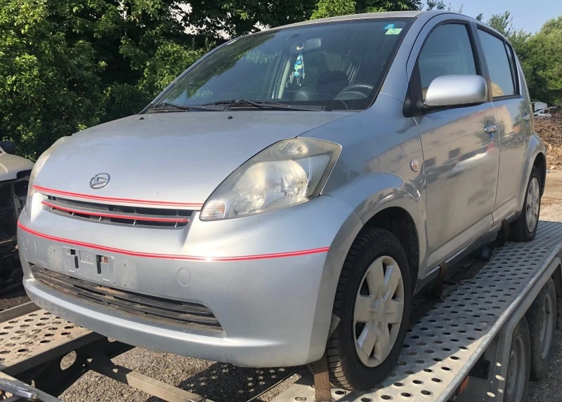 Daihatsu Sirion 1.3  i 4x4, снимка 1 - Автомобили и джипове - 46379619