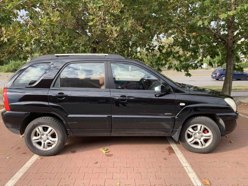 Kia Sportage 2.0 CRDi, снимка 8 - Автомобили и джипове - 48077924