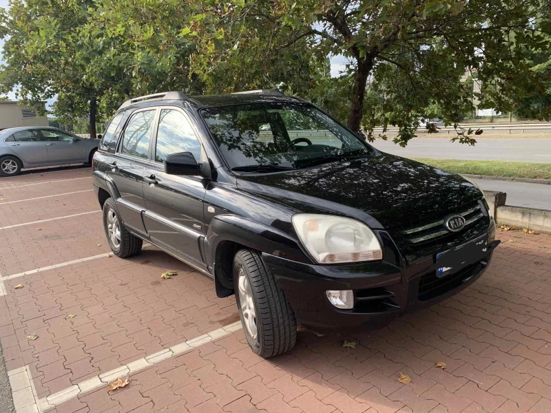 Kia Sportage 2.0 CRDi, снимка 10 - Автомобили и джипове - 48077924