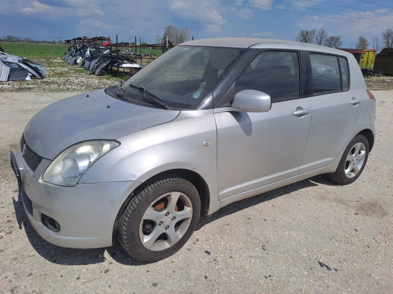 Suzuki Swift 1.3i 4x4, снимка 2 - Автомобили и джипове - 46560730