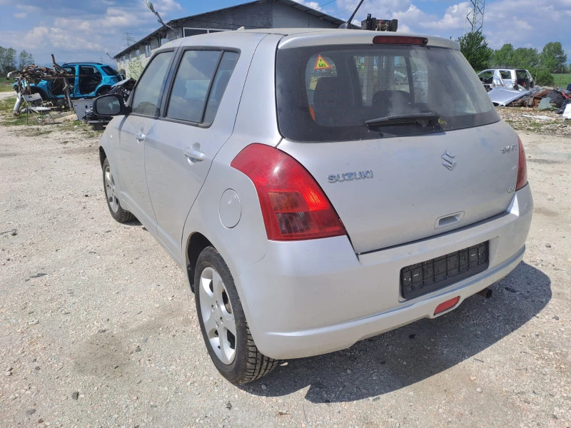 Suzuki Swift 1.3i 4x4, снимка 8 - Автомобили и джипове - 46560730