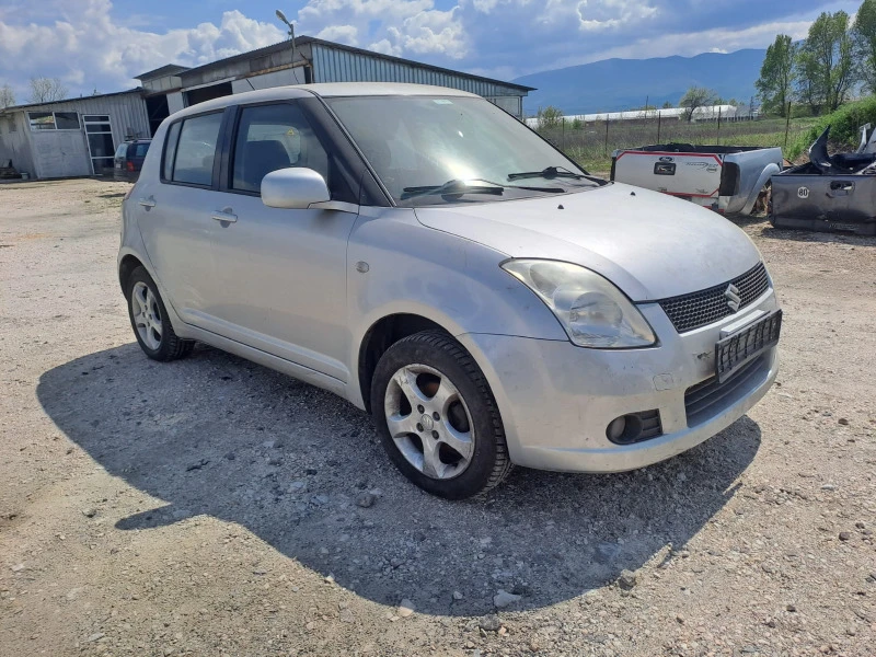 Suzuki Swift 1.3i 4x4, снимка 1 - Автомобили и джипове - 46560730