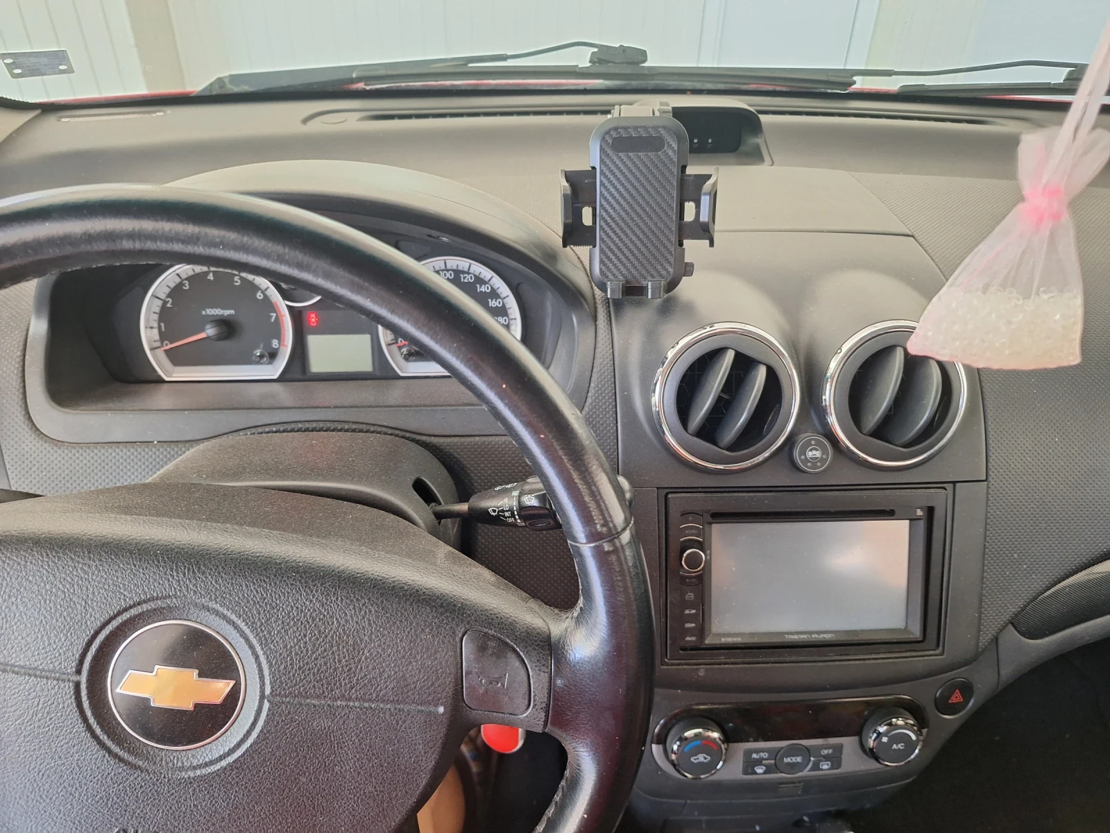 Chevrolet Aveo, снимка 9 - Автомобили и джипове - 55554628