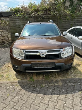 Dacia Duster 1.6 i, снимка 1