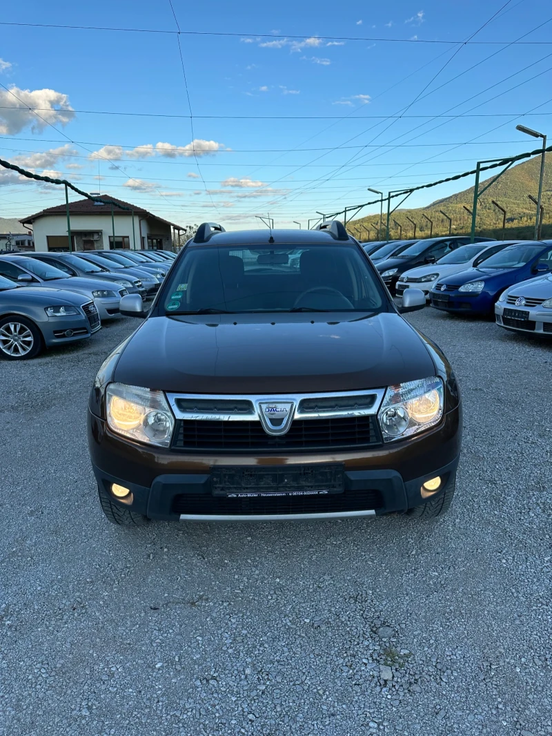 Dacia Duster 1.6 i, снимка 5 - Автомобили и джипове - 47498228