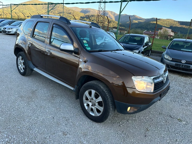 Dacia Duster 1.6 i, снимка 4 - Автомобили и джипове - 47498228