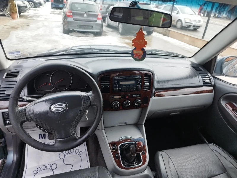 Suzuki Grand vitara 2.0hdi, снимка 11 - Автомобили и джипове - 48575668