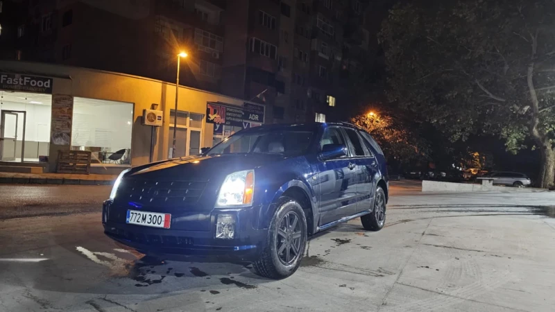 Cadillac Srx, снимка 2 - Автомобили и джипове - 52639404