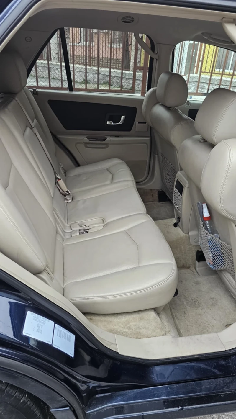 Cadillac Srx, снимка 9 - Автомобили и джипове - 52639404